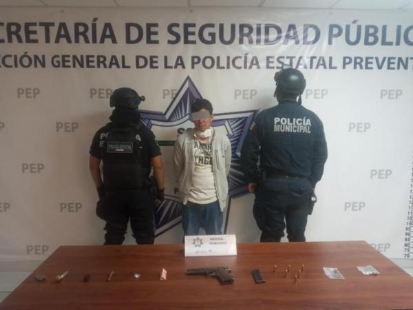 Cae en Atlixco narcomenudista con moto Suzuki y un arma 9 milímetros