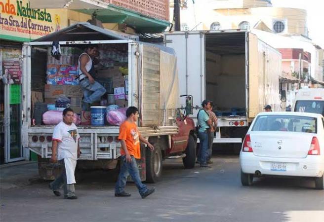 Establecen horarios de carga en áreas comerciales de Zacapoaxtla