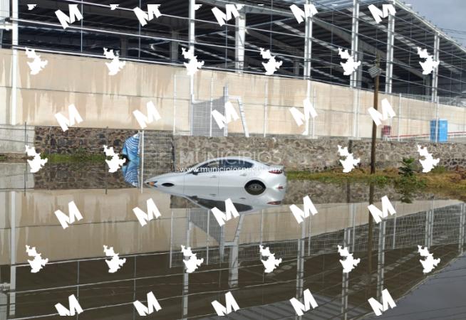 Lluvias generan encharcamientos en parque industrial de Huejotzingo