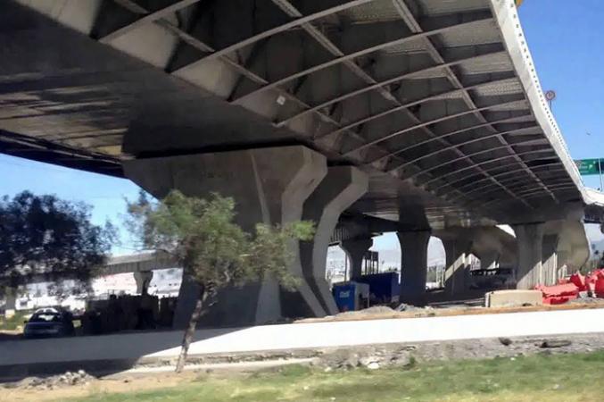 Por depresión madre intenta lanzar a bebé del puente de Calzada Zaragoza