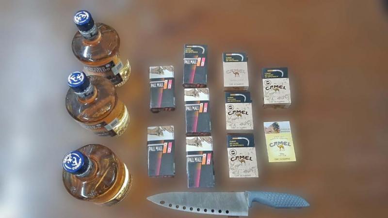 Los detienen por robar tequila Rancho Escondido en Oxxo de Puebla image 1