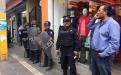 Con granaderos retiran puestos ambulantes en Texmelucan image 1