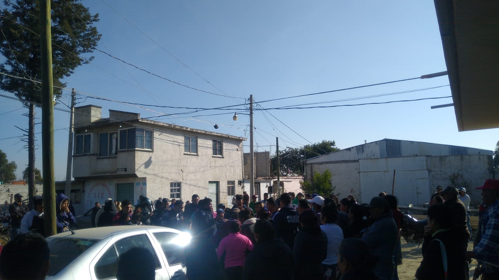 Golpean y balean a padre e hijo tras asalto en Moyotzingo