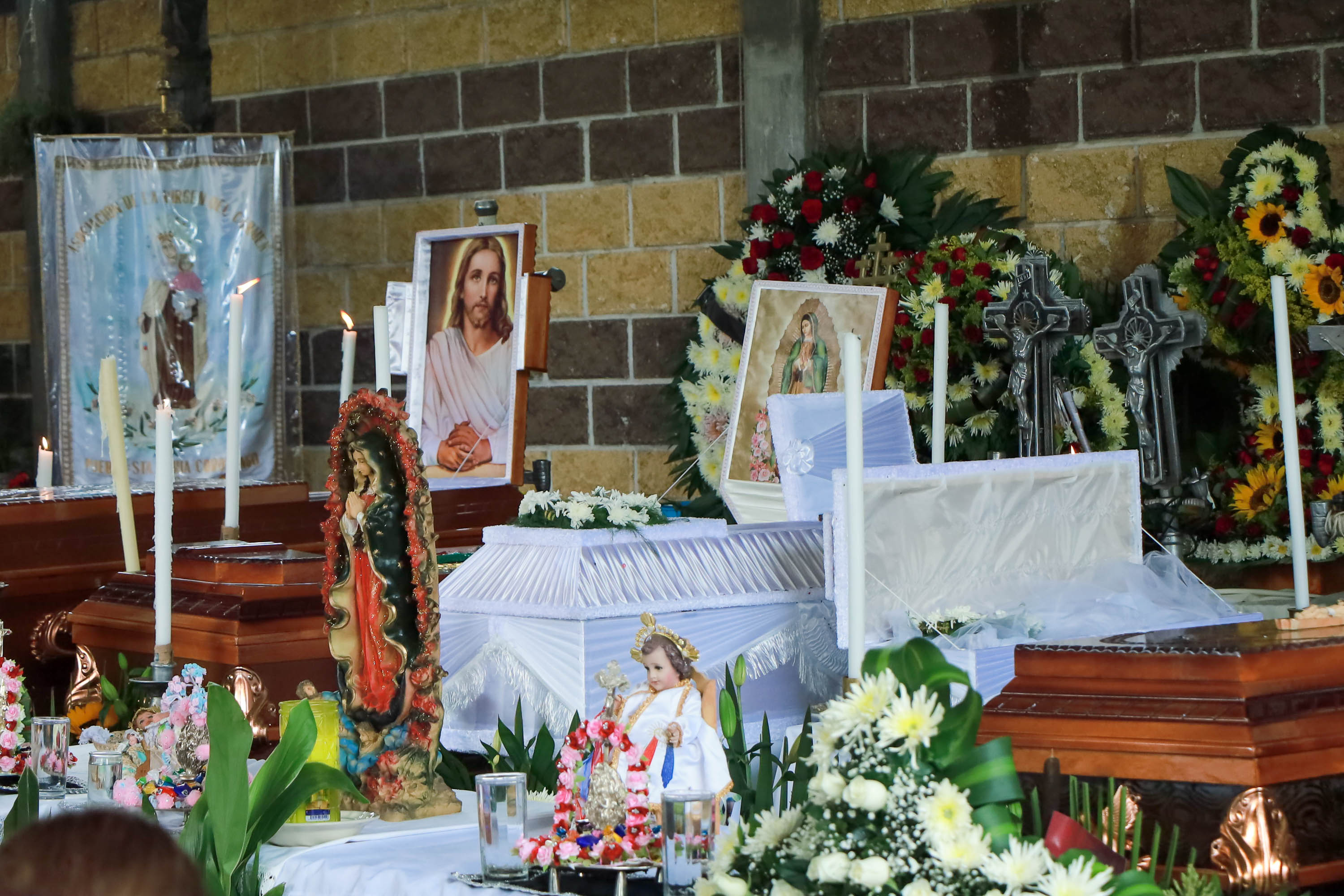 VIDEO Al grito de justicia, velan los cuerpos de familia fallecida en Coronango