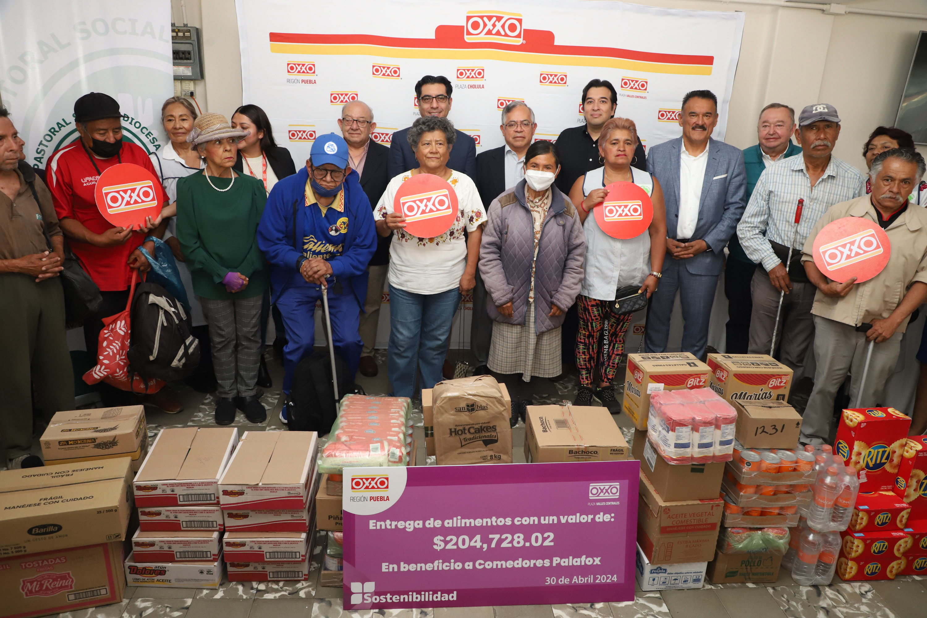 VIDEO Oxxo entrega alimentos a la Red de Comedores Palafox
