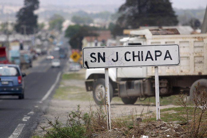 Se enfrentan transportistas en San José Chiapa por obras de Audi