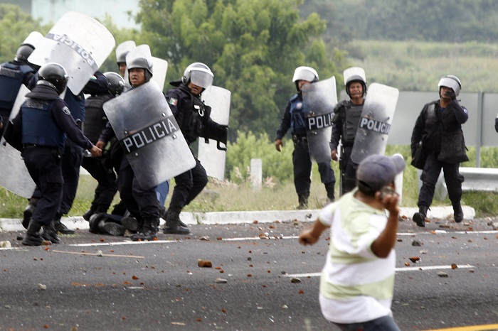 Cuarenta policías lesionados y cinco manifestantes detenidos en Chalchihuapan