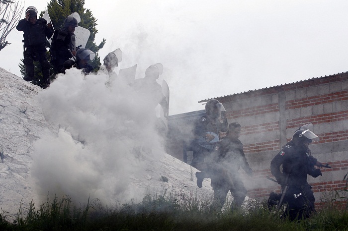 Cuarenta policías lesionados y cinco manifestantes detenidos en Chalchihuapan