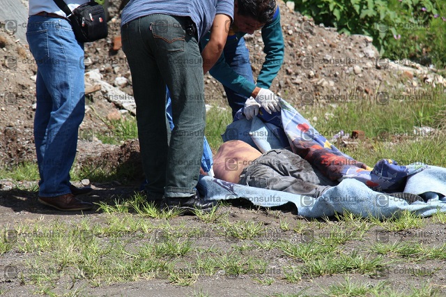 Golpeado y con bolsa en la cabeza hallan cadáver en Ocoyucan