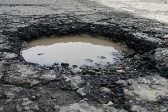 Reportan enorme bache en la México-Puebla