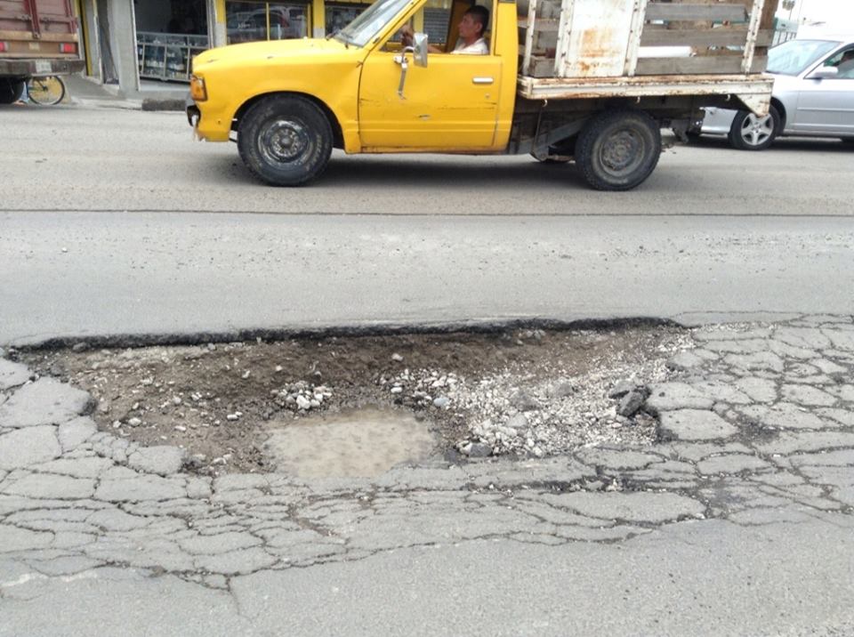 Baches de hasta metro y medio inundan vialidades de Izúcar de Matamoros