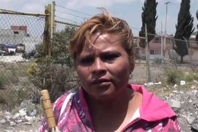 Asegura mujer pintar 20 bardas diarias a favor de Rincón