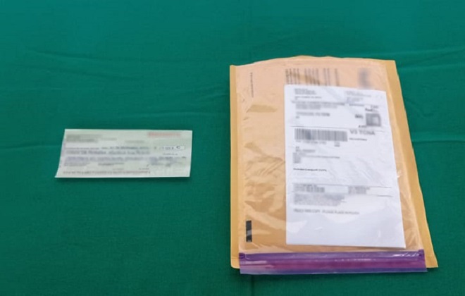 Asegura GN cheque de 17 mil dólares enviado de Canadá a Tehuacán