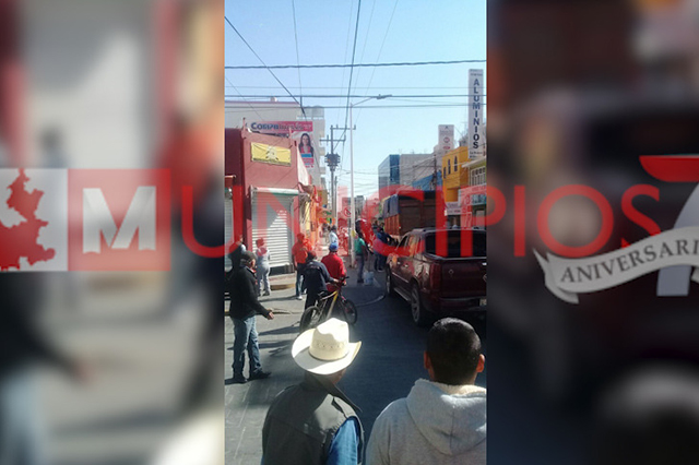 Otro desalojo en Texmelucan termina en balacera con tres lesionados