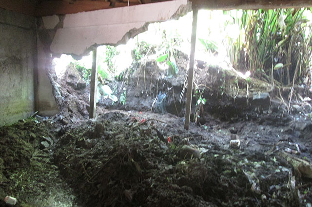 Deslave derriba paredes de una vivienda en Huauchinango