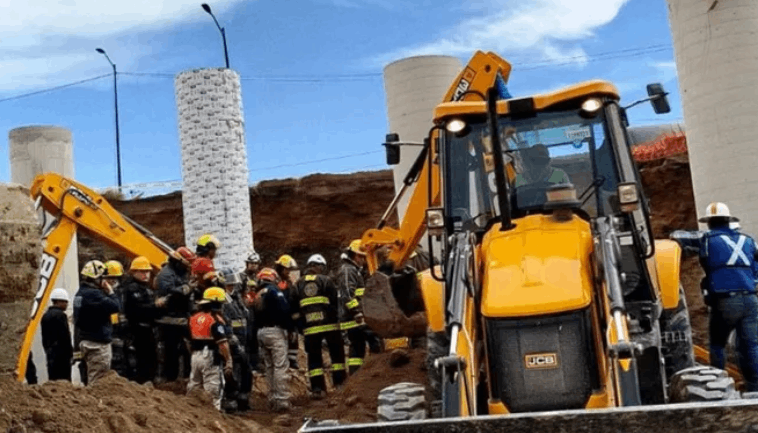 Entregan cuerpos e indemnización de trabajadores por obra en Vía Atlixcáyotl 