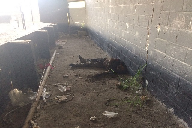 Encuentran cadáver tirado en recinto ferial de Teziutlán