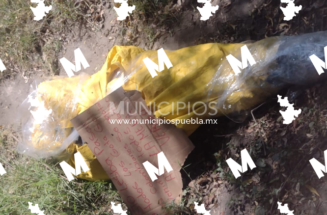 Localizan cadáver embolsado y con mensaje en límites entre Tlaxcala y Puebla