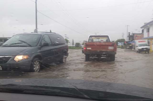 Lluvia desborda presa cosamaluapan Atlixco e inunda calles en Tepeaca
