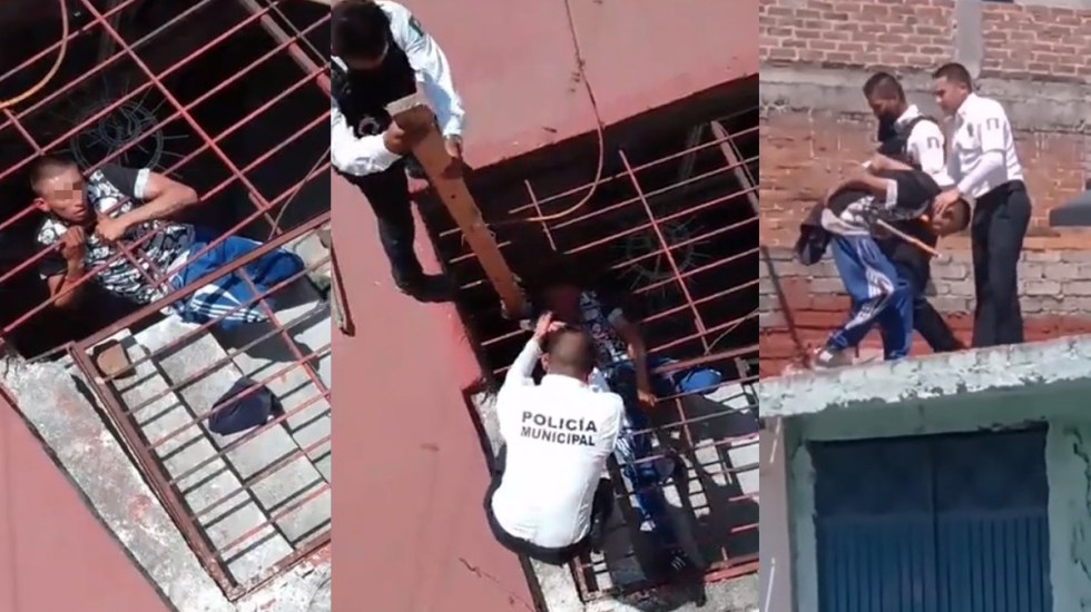 VIDEO Ladrón queda atorado al robar una casa y policías lo rescatan