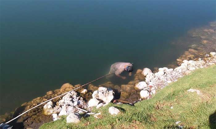 Cadáver en laguna de Aljojuca sería el de un trabajador de PEMEX