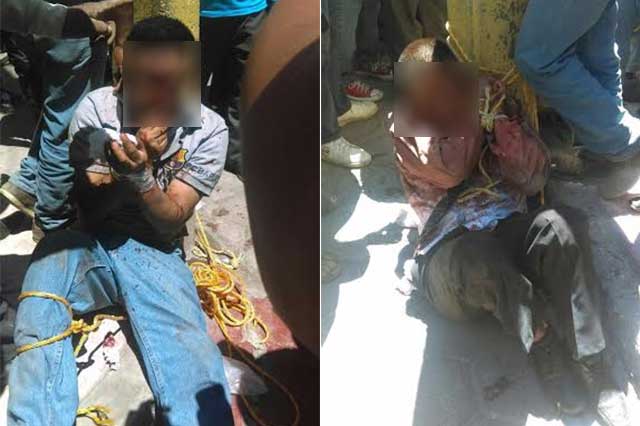 Pobladores atan y golpean a presuntos ladrones en Cuacnopalan
