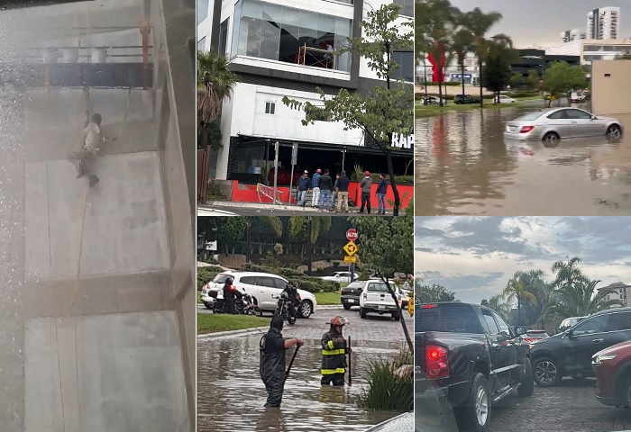 Tormenta deja colgado a trabajador e inunda a Lomas de Angelópolis