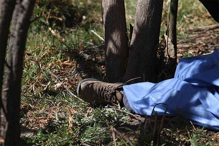 Semienterrado encuentran cadáver en terrenos de Atlixco