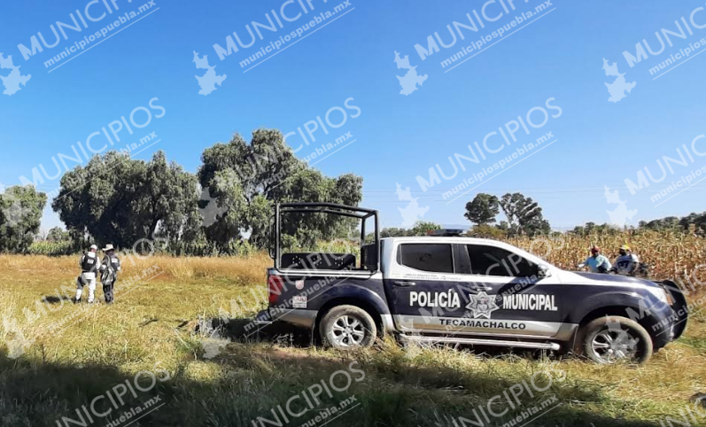 Hallan a mujer de 30 años acribillada en predio de Tecamachalco