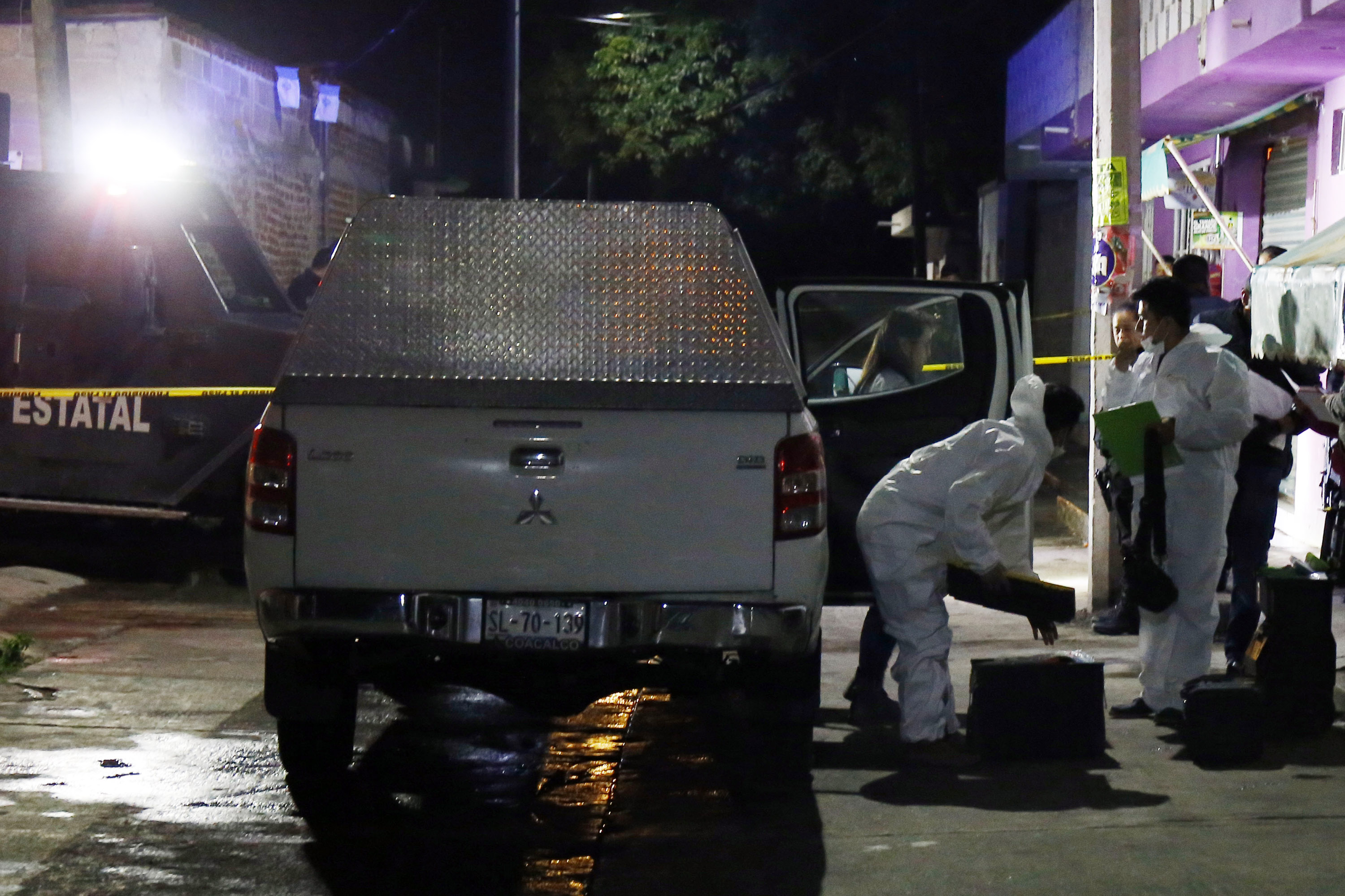 Sepultan a familia asesinada en Tecaltzingo