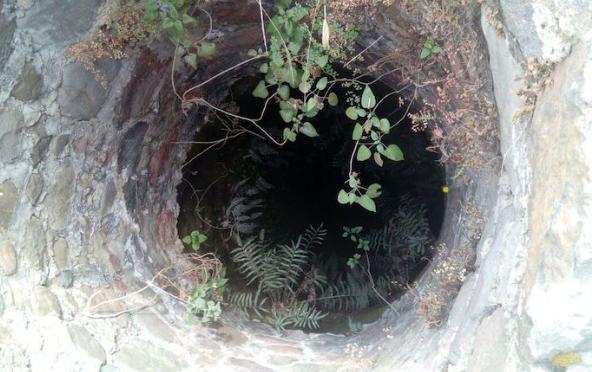 Dentro de pozo hallan cadáver en Huejotzingo