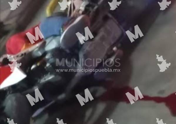 Al jugar con pistola muere joven en calles de Texmelucan