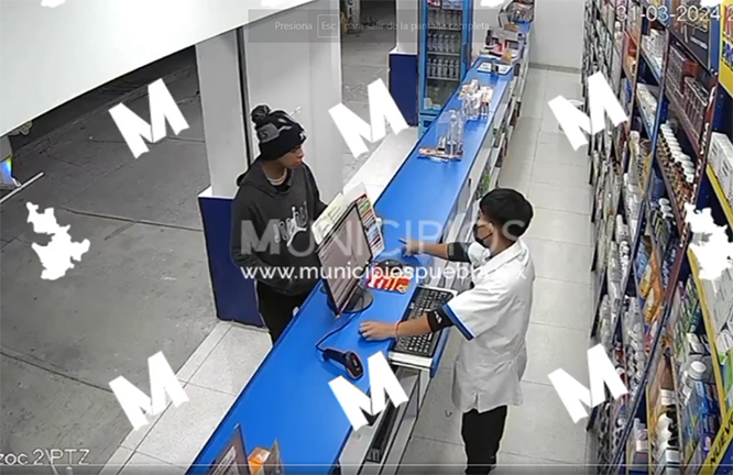 VIDEO Solitario sujeto asalta a empleados de farmacias Simi en Amozoc