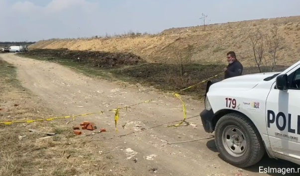 VIDEO Dejan cuerpo decapitado en camino al relleno sanitario de Calpan