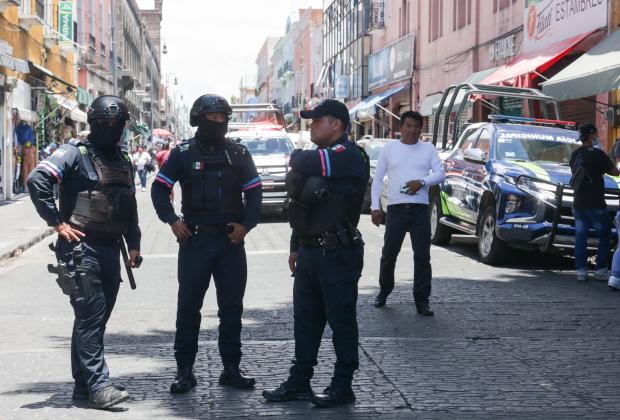 Presunto conflicto con comerciantes, genera movilización policiaca en Puebla