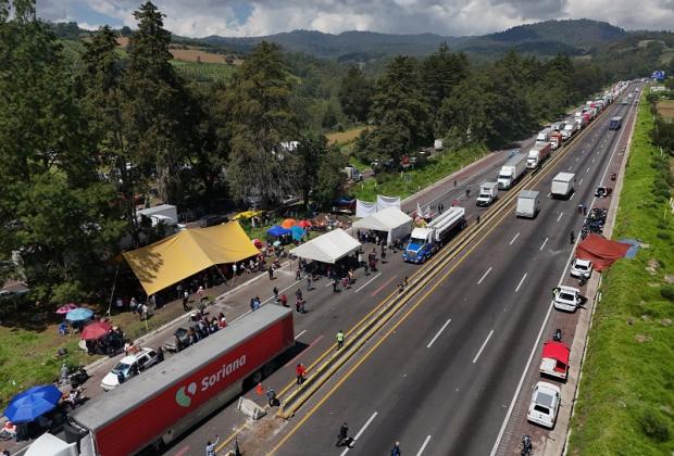 Ya hay denuncia por bloqueo de la México-Puebla, confirma FGE