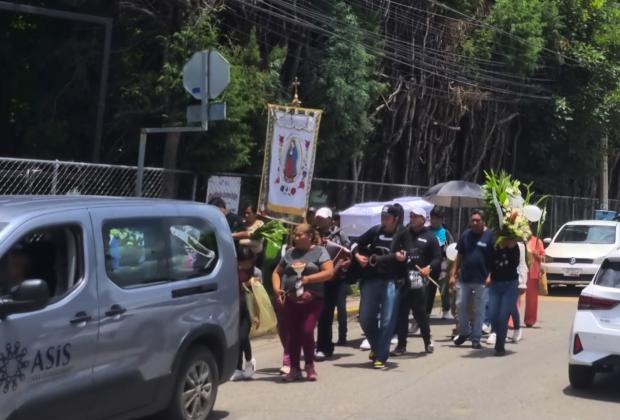 Con globos y flores, dan último adiós a niño asesinado en San Andrés Cholula