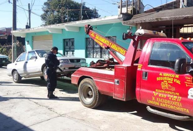 Cierran calles de San Pedro Cholula tras manifestación contra grúas Cronos