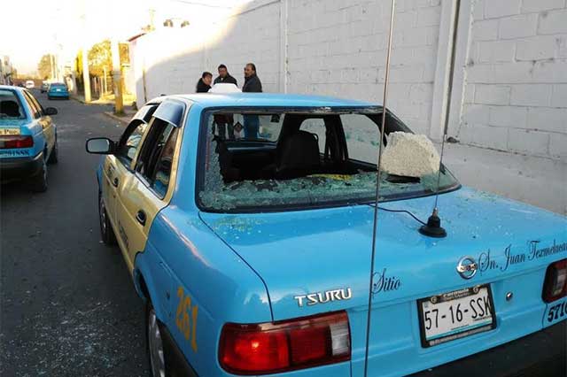 Riña entre taxistas y ambulantes en Texmelucan deja tres heridos