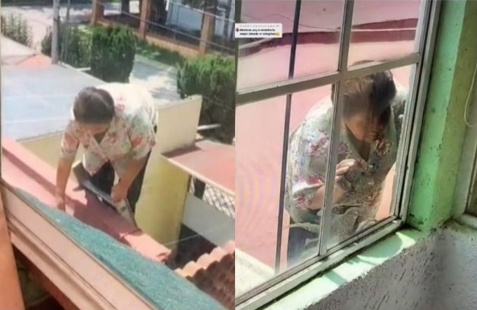 VIDEO Mujer de la tercera edad se sube a la azotea para espiar a sus vecinos 