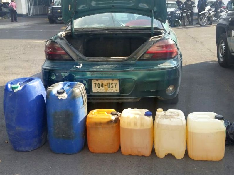 Aseguran a 2 hombres por transportar combustible robado en Puebla