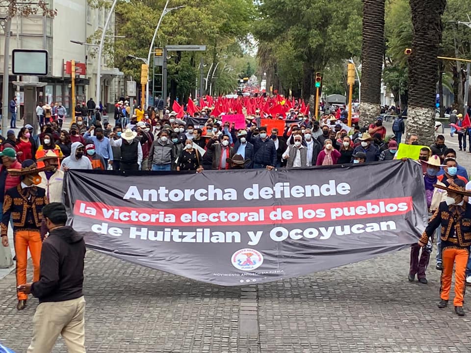 Marcha AC y exige respeto a sus triunfos en Huitzilan y Ocoyucan